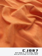 microfiber-suede-fabric-320gsm-160cm-knitted-2-way-stretch-short-nap-tangerine-for-apparel-in-stock-sample-card-cj087-03
